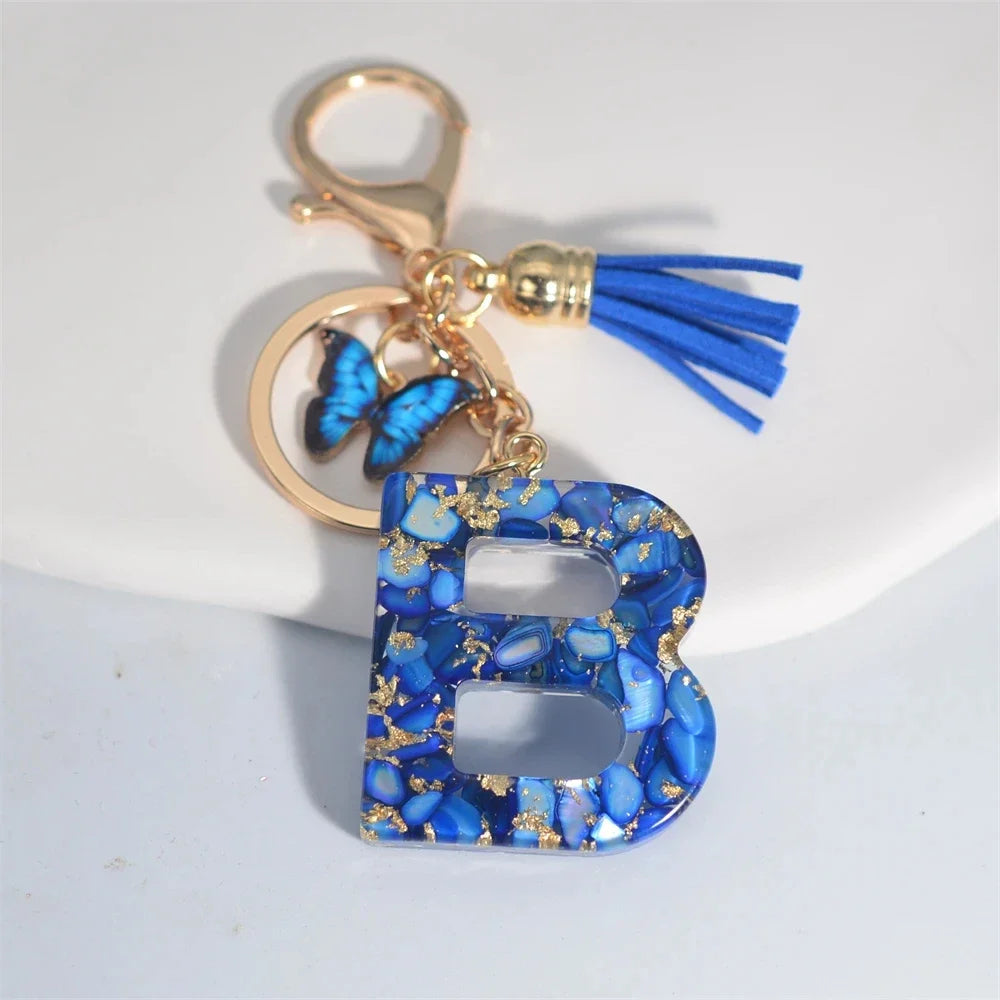 4. Fashion A–Z Letter Keychain with Blue Stone and Butterfly Tassel Pendant
