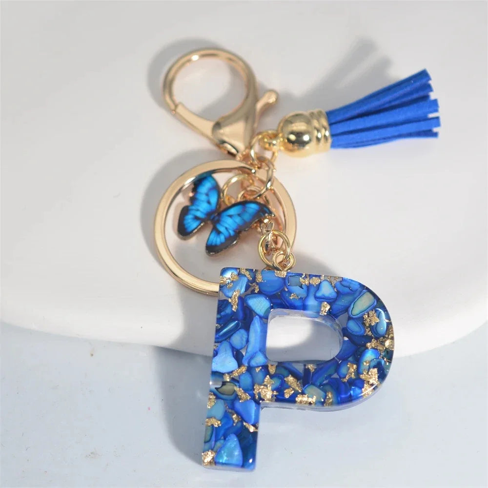4. Fashion A–Z Letter Keychain with Blue Stone and Butterfly Tassel Pendant