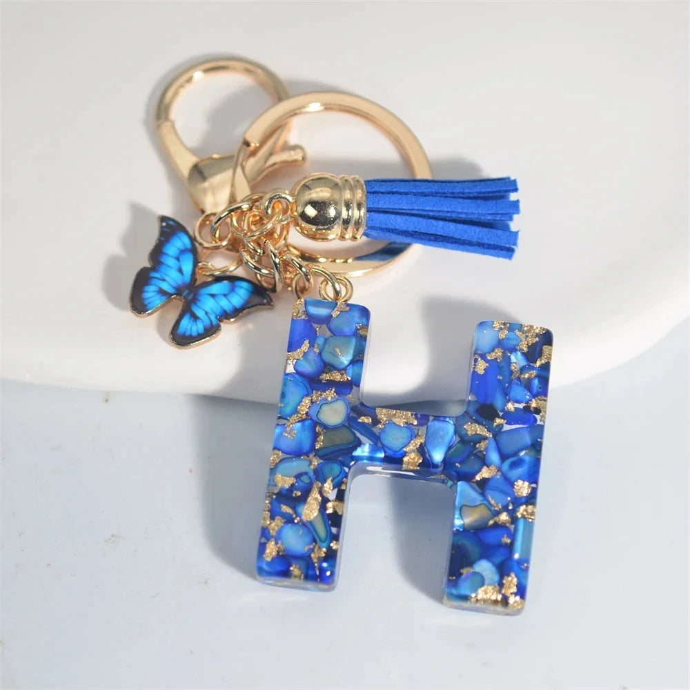 4. Fashion A–Z Letter Keychain with Blue Stone and Butterfly Tassel Pendant