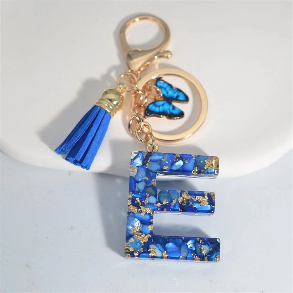 4. Fashion A–Z Letter Keychain with Blue Stone and Butterfly Tassel Pendant