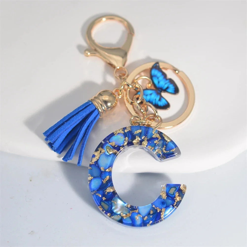 4. Fashion A–Z Letter Keychain with Blue Stone and Butterfly Tassel Pendant