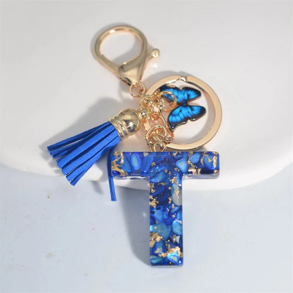 4. Fashion A–Z Letter Keychain with Blue Stone and Butterfly Tassel Pendant