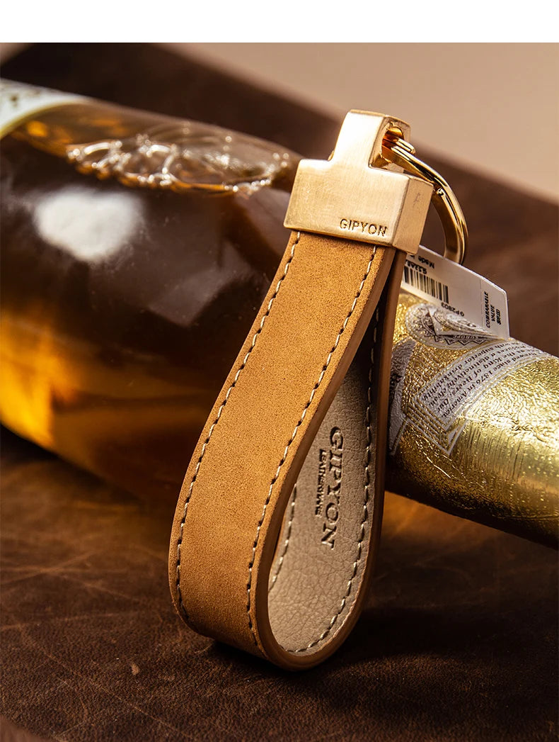 Exquisite Cowhide Keychain for Car or Bag – Durable & Fashionable