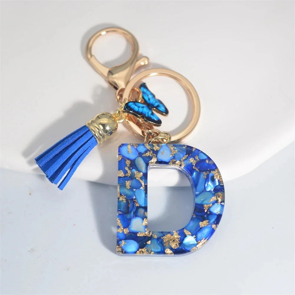 4. Fashion A–Z Letter Keychain with Blue Stone and Butterfly Tassel Pendant